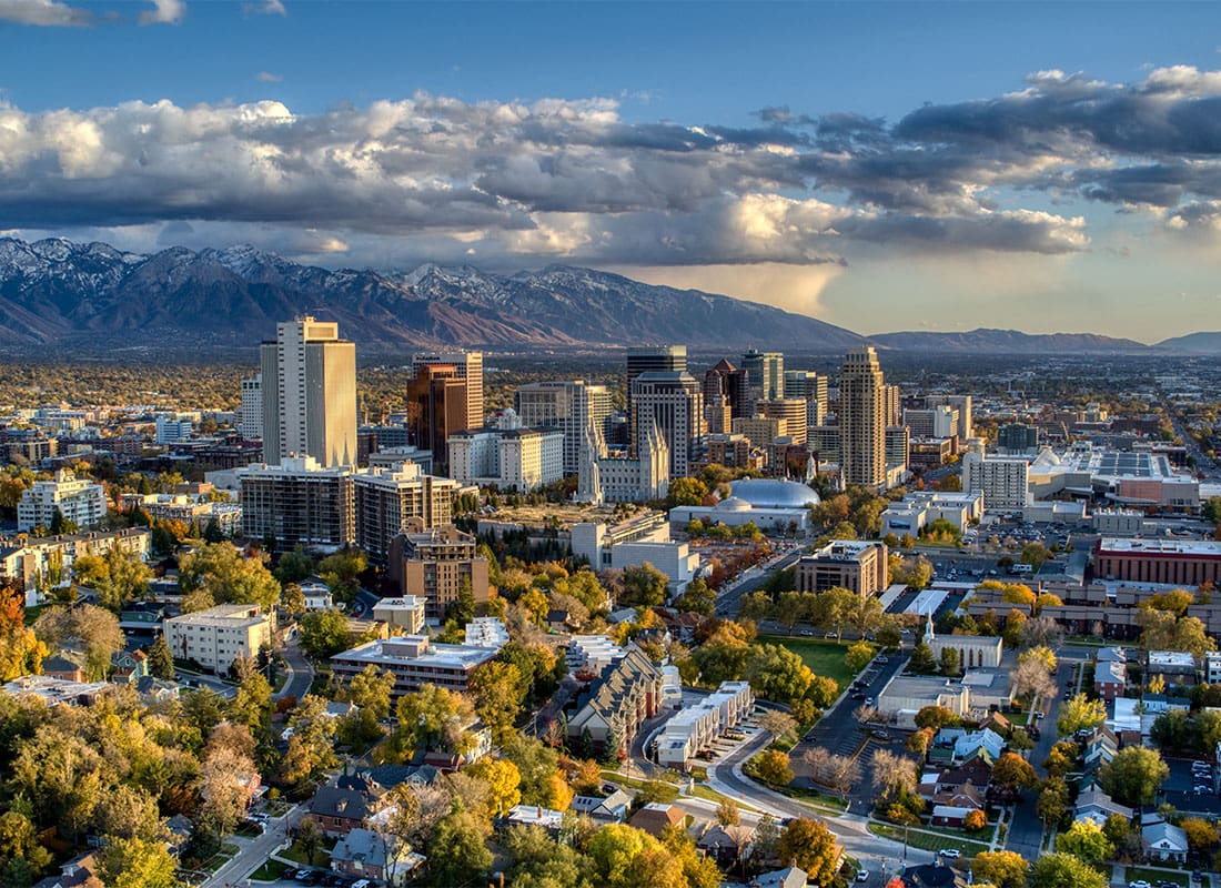 Clearfield, UT - Provo Skyline and Main Street Area is Surrounded by Snow Capped Wasatch Mountains